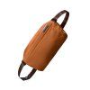 Bellroy Sling - Bronze  + Testovací sada toaletních vod ZDARMA